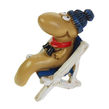 Dekofigur Wattwurm mit blauer Mütze im Liegestuhl...